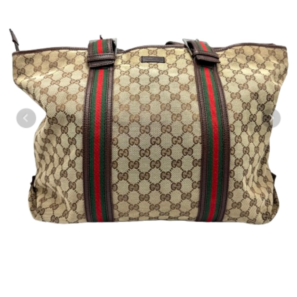 Gucci Brown Leather Tag Detail